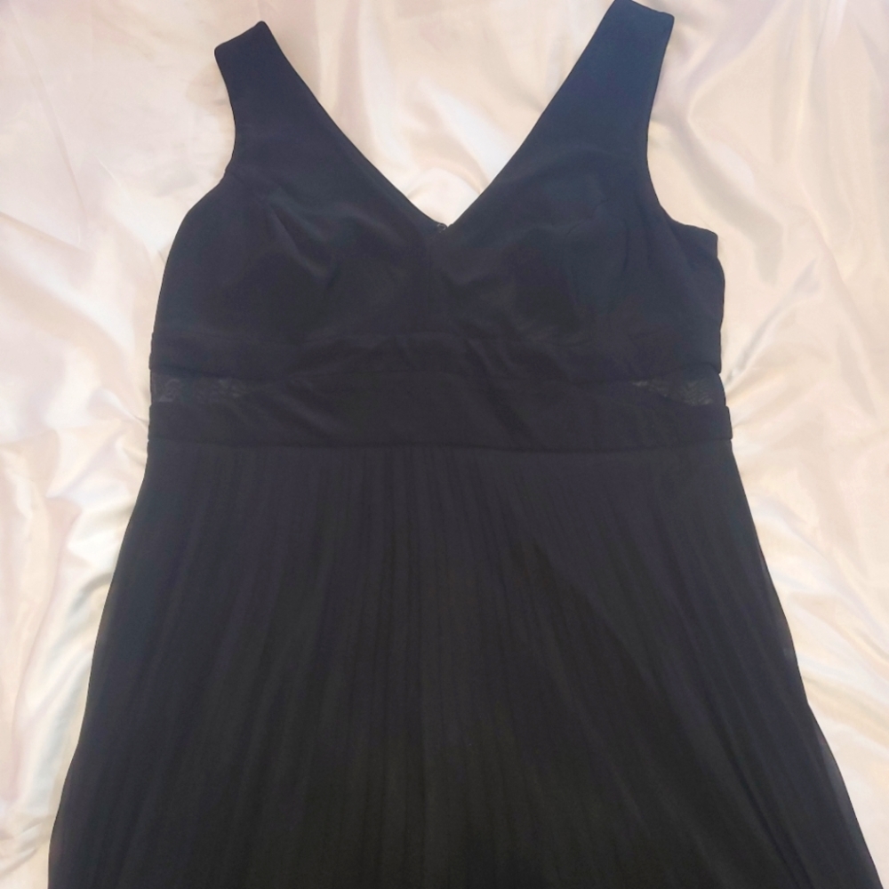 Formal floor length pleated maxi dress with mesh cutouts on the side